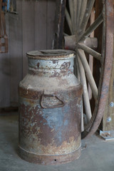 Vintage milk bucket and cartwheel