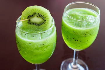 Closed up glass of smoothies fresh kiwi