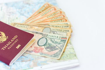 Thailand passport for tourism with Annapurna Region Nepal map and Nepali notes.