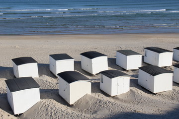 In Denmark, Scandinavia, Europe. Bath houses on the beach of Lokken. 