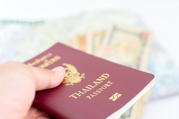 Thailand passport for tourism hold in hand.