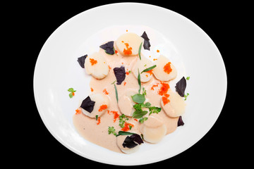 Scallop carpaccio with flying fish roe, isolated