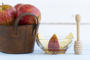 Fototapeta premium Apples and Honey. A traditional Jewish new year snack 
