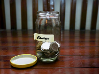 Saving Money Concept With College Text Written Label.Shallow DOF.