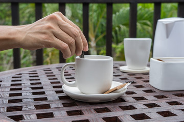 Stirring in coffee cup