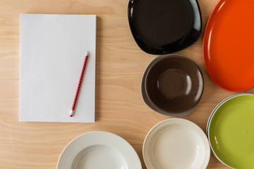 dishes, paper and pencil background