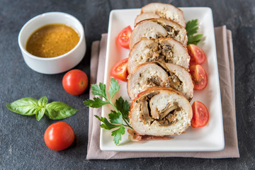 Rolled meat with champignons