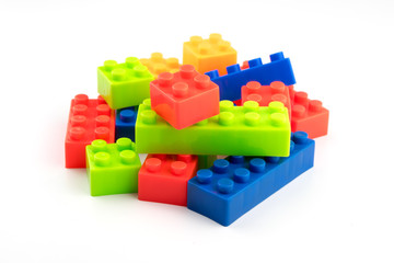 Fototapeta premium Colorful plastic blocks for kids isolated on white background