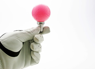 Golf Glove with pink Ball and white background