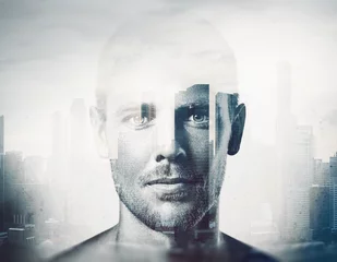 Double exposure  black and white portrait of a handsome man © SFIO CRACHO