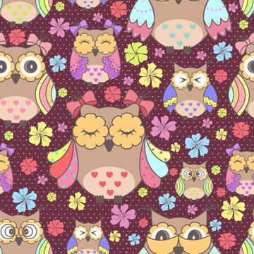 Beautiful seamless wallpaper with owls and flowers on a purple background