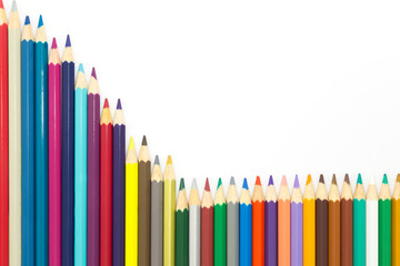 Set of color pencils on white background, multiple colors