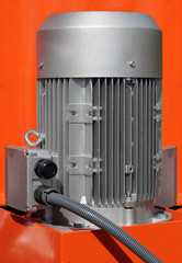 Red powerful electric motors for modern industrial equipment