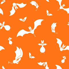 Vector seamless halloween bats silhouette on orange background