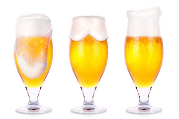 Frosty glasses of light beer isolated 