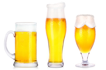 Frosty glasses of light beer isolated 