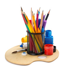 paint supplies and holder basket on white