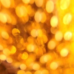 Gold circles of light swirling abstract background blur pattern great for New Year's Eve 2020 or Christmas banner cover