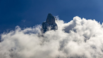 Naklejka na ściany i meble peak over clouds