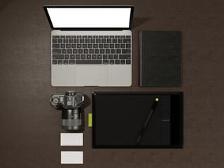 Designer accessories and gadgets on brown leather  background