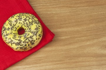 Sweet donuts with coffee. Sweet treat with coffee. Donuts as quick homemade treats. Junk food diets enemy. A symbol of junk food and obesity, donut for a snack.

