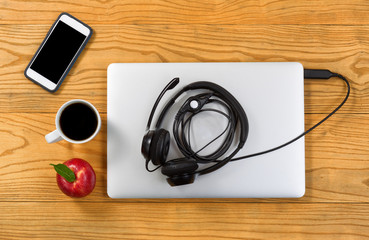 Quick set up for mobile work office on wooden desktop