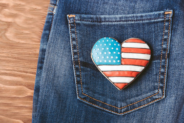 Patriotic cookie on a back pocket of jeans