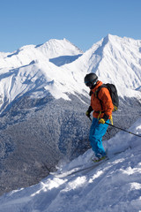 Fototapeta na wymiar Skier in deep powder, extreme freeride