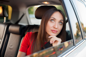 Cheerful young girl is traveling by personal transport