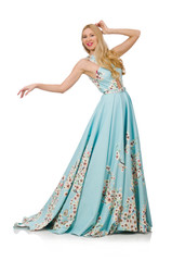 Fototapeta premium Woman in blue long dress with flower prints isolated on white