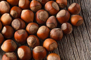 Hazelnuts on rustic wooden table