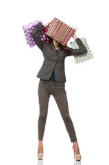 Attractive woman with shopping bags isolated on white