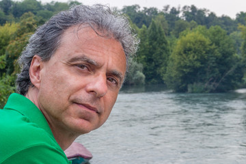 handsome man and flowing river