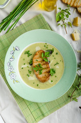 Creamy leek herby soup with toast
