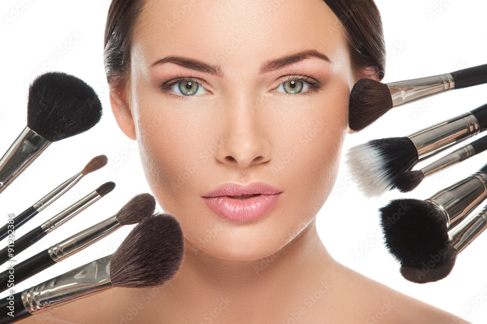 Poster beautiful woman face and makeup brushes