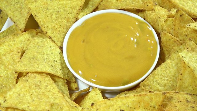Rotating Nachos with cheese dip (not loopable)