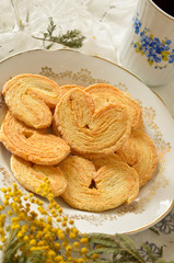 Palmeras - sweet puff pastry. Heart shaped cookies with sugar