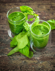 Fresh green spinach leaves smoothie. Healthy food concept