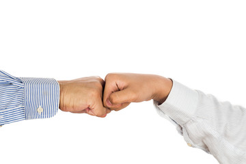 Fist bump on formal wear, gesturing an agreement and cooperation