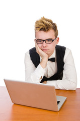 Smart student sitting with laptop isolated on white