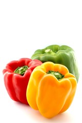 Colorful Capsicums on White Background