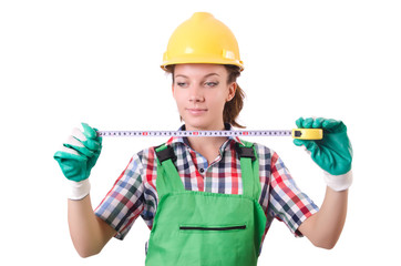 Female workman in green overalls isolated on white