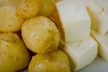 Closeup freshly prepared balls of green banana and pieces fresh