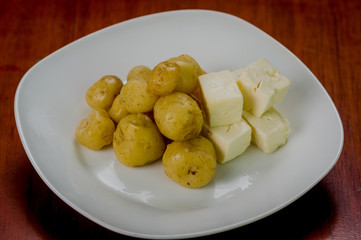 Closeup freshly prepared balls of green banana and pieces fresh