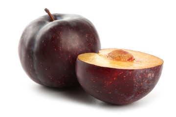 Fresh plums isolated on white