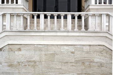 Fototapeta na wymiar White Stone Staircase To The Main Entrance Of The House