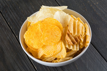potato chips on wood background