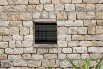 Old White Stonewall With Lattice Window Detail Background