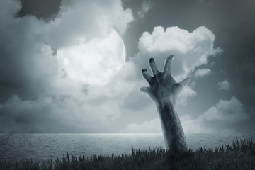Zombie hand come out from ground