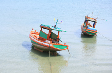 Small fishing boats near the island